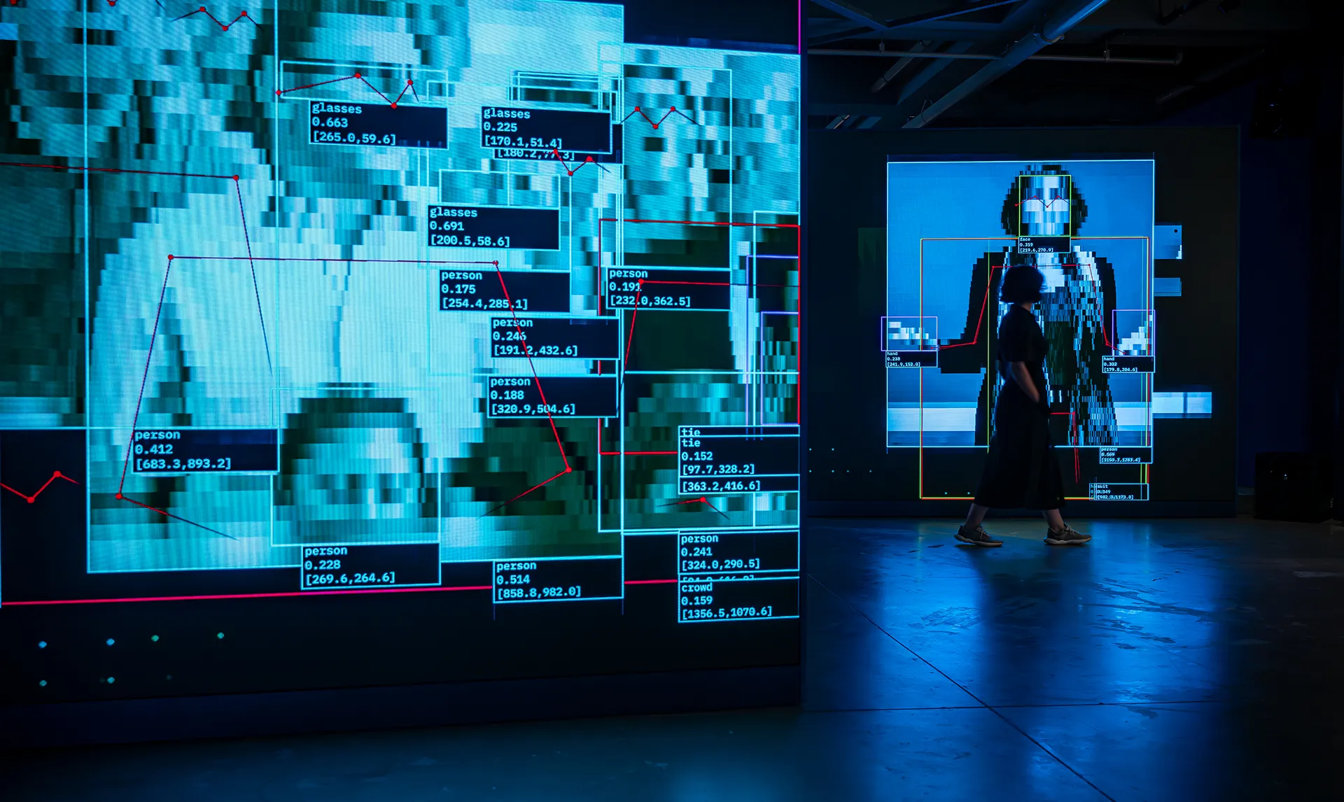Wide view of the Kontact installation spanning four screen surfaces at Salt Galata